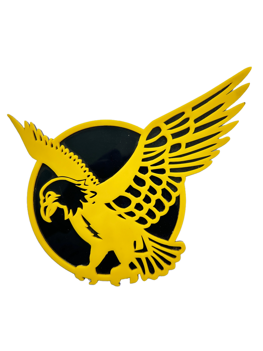 Yellow griffin emblem on a black circle with a white background