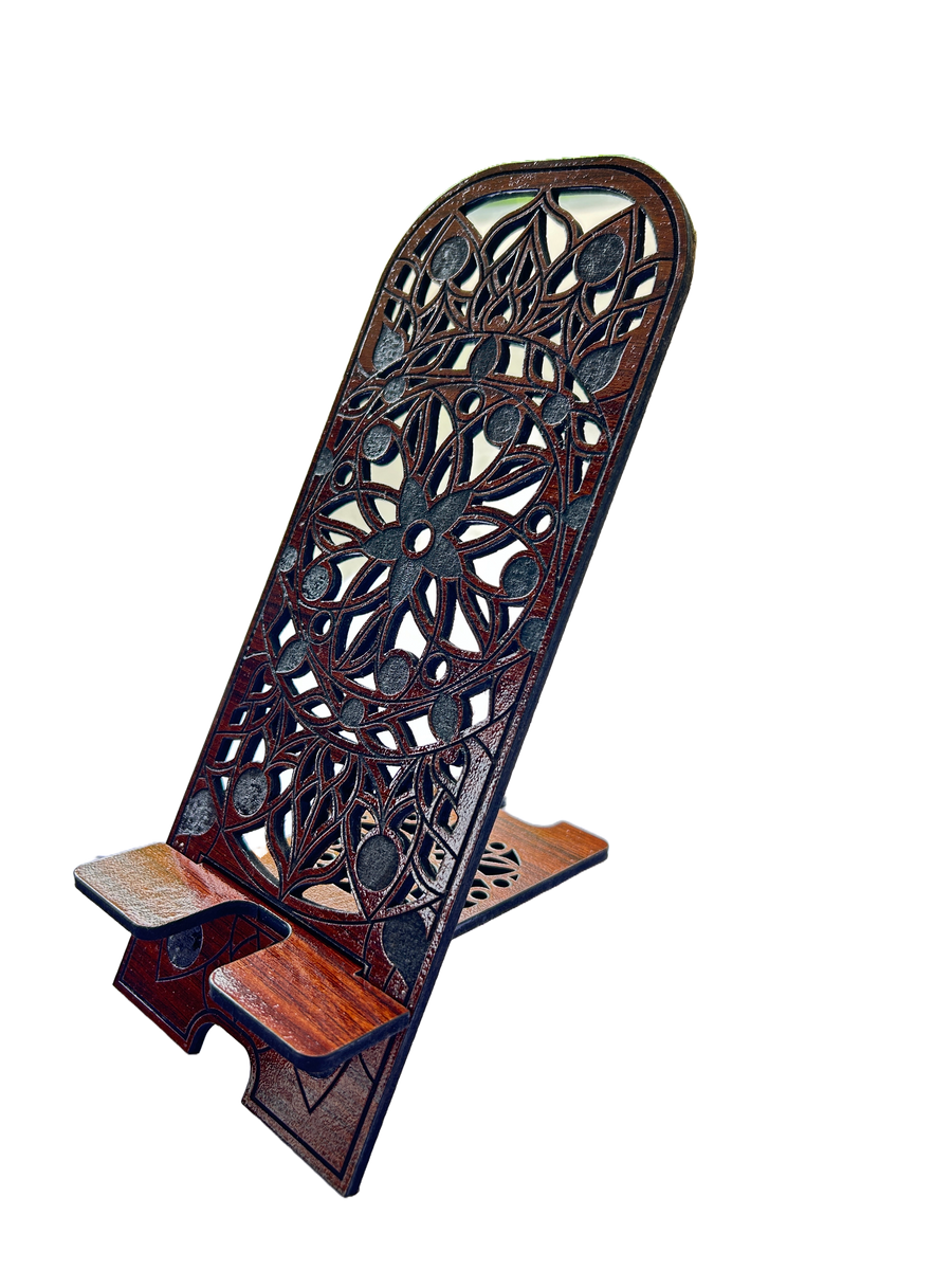 Wooden book stand with intricate carvings on a white background