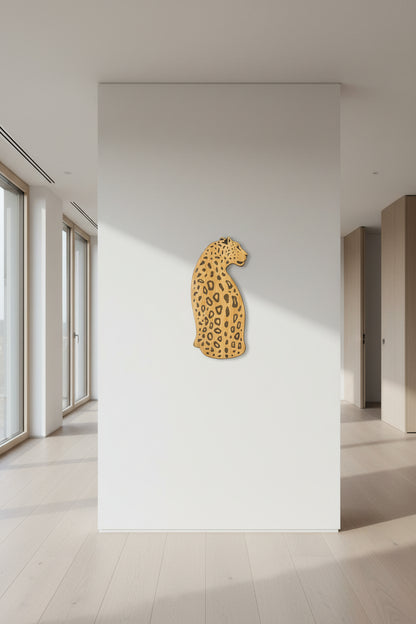 Leopard print wall art on a white wall in a modern interior setting