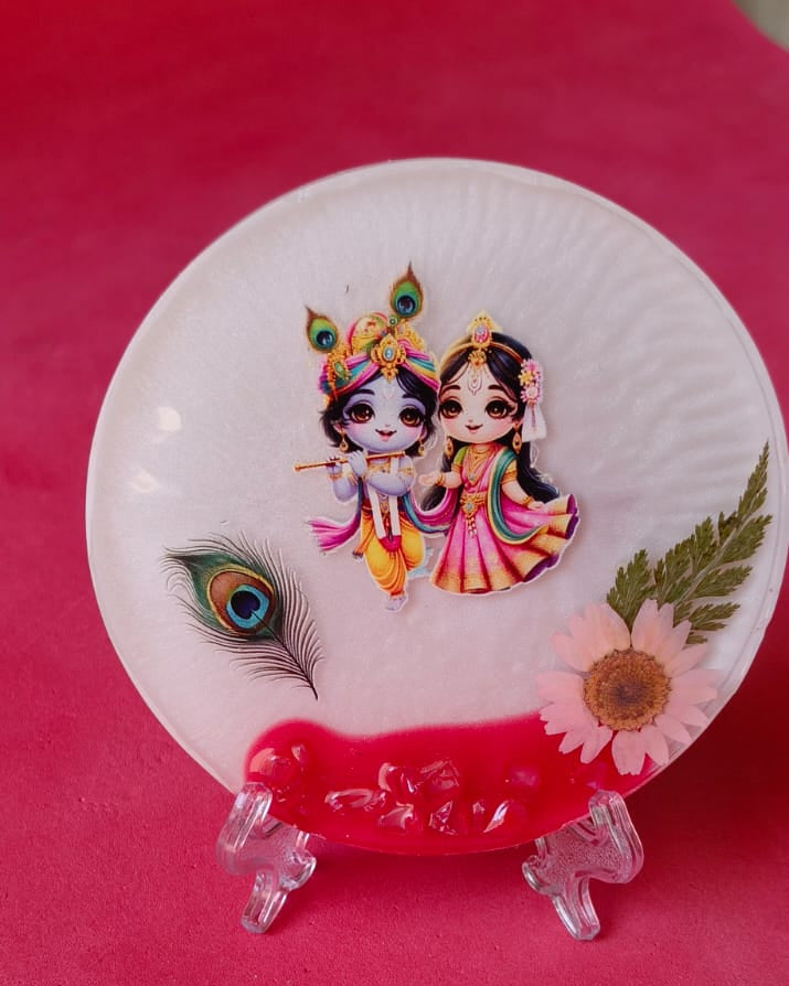 Decorative plate with cartoon characters on a pink background