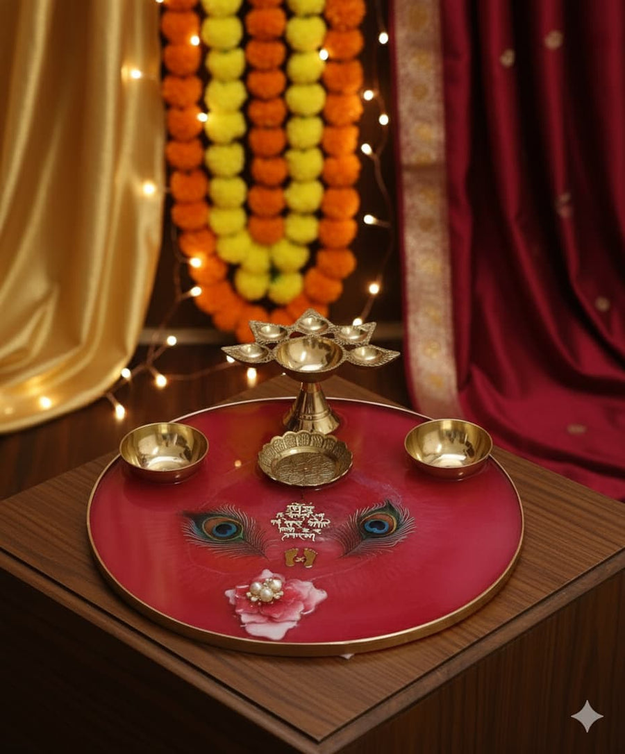 Decorative tray with lit lamps on a wooden surface, surrounded by colorful decorations.